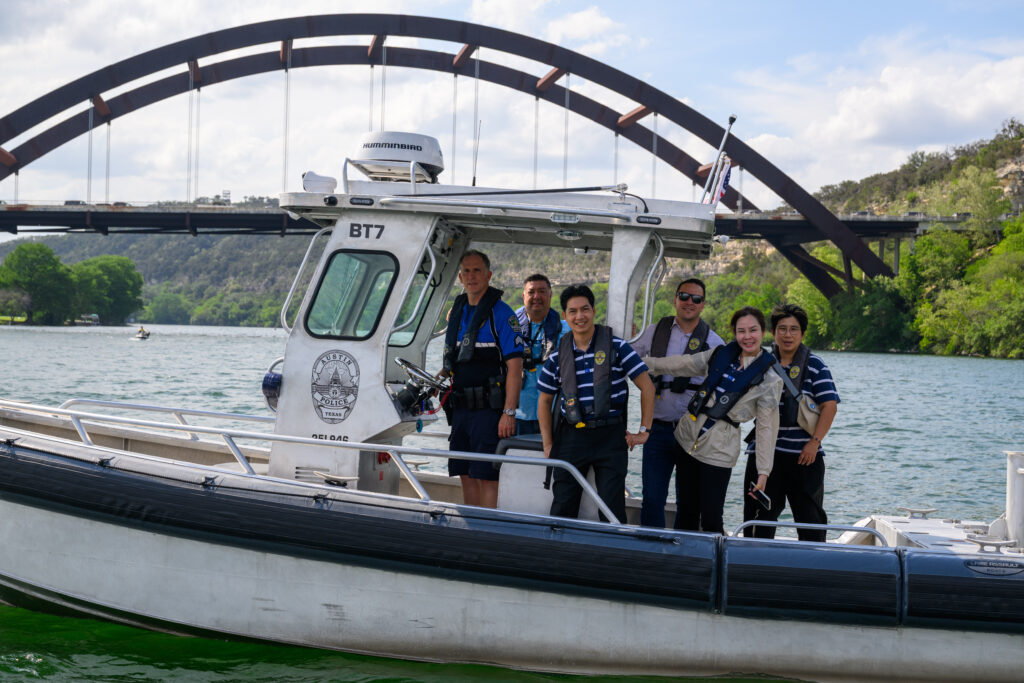 Austin lake tour, delegation on safety boat